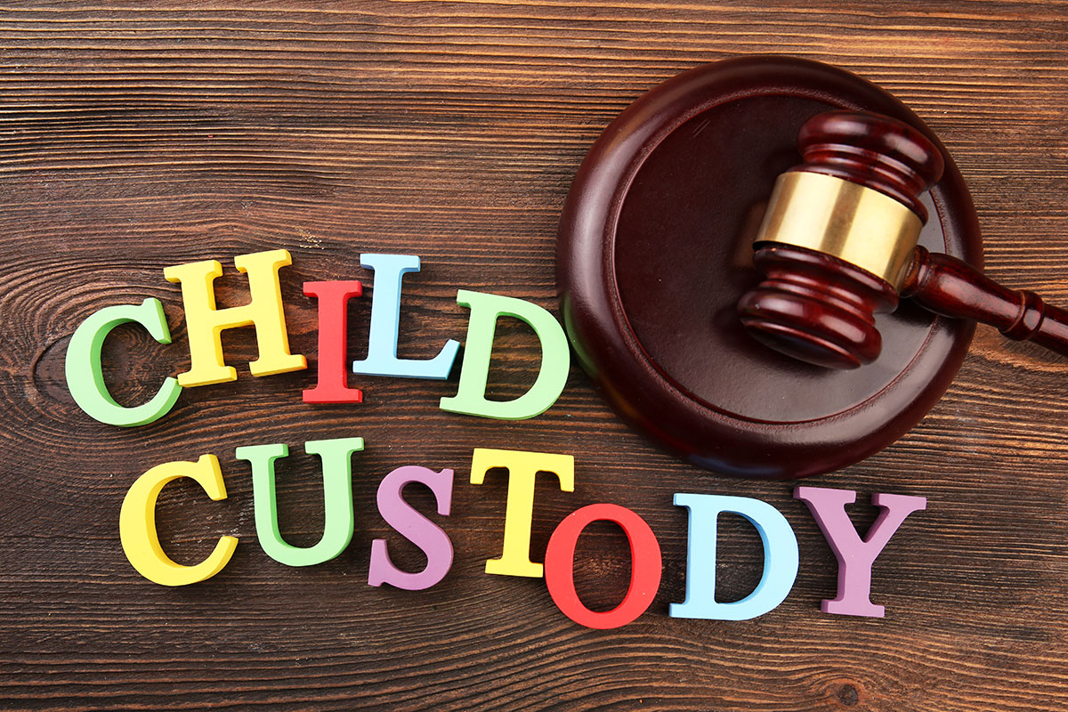 the words child custody next to a gavel